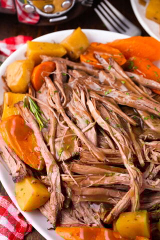 Very tender slow cooker red wine pot roast.