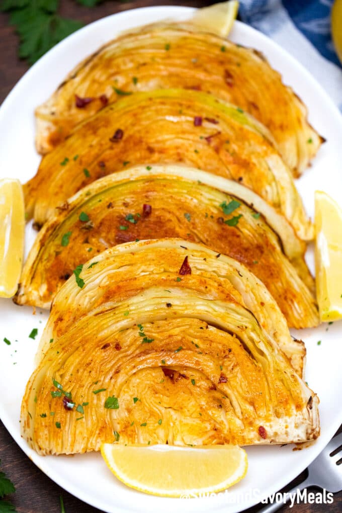 roasted cabbage steaks on a serving plate