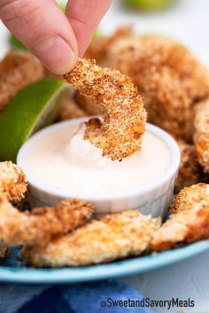 Crispy coconut shrimp dipped in a homemade dipping sauce