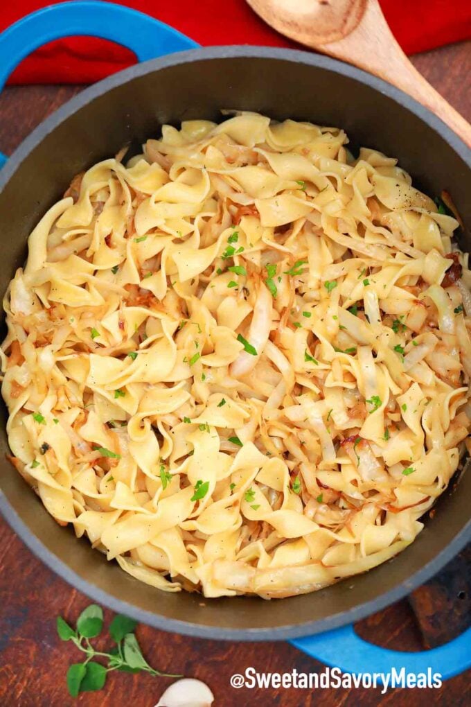 a large pot of fried cabbage and noodles
