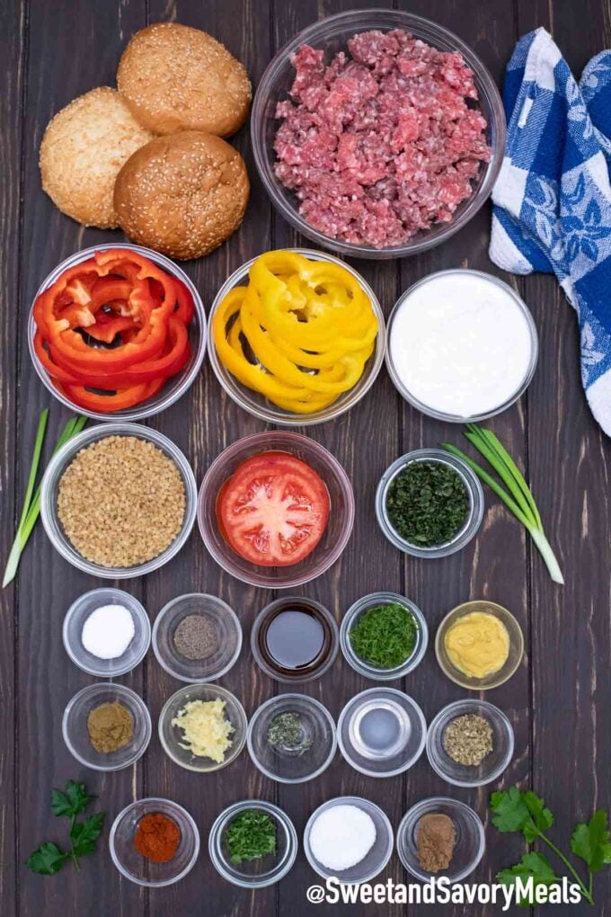 lamb burgers ingredients in glass bowls on a table