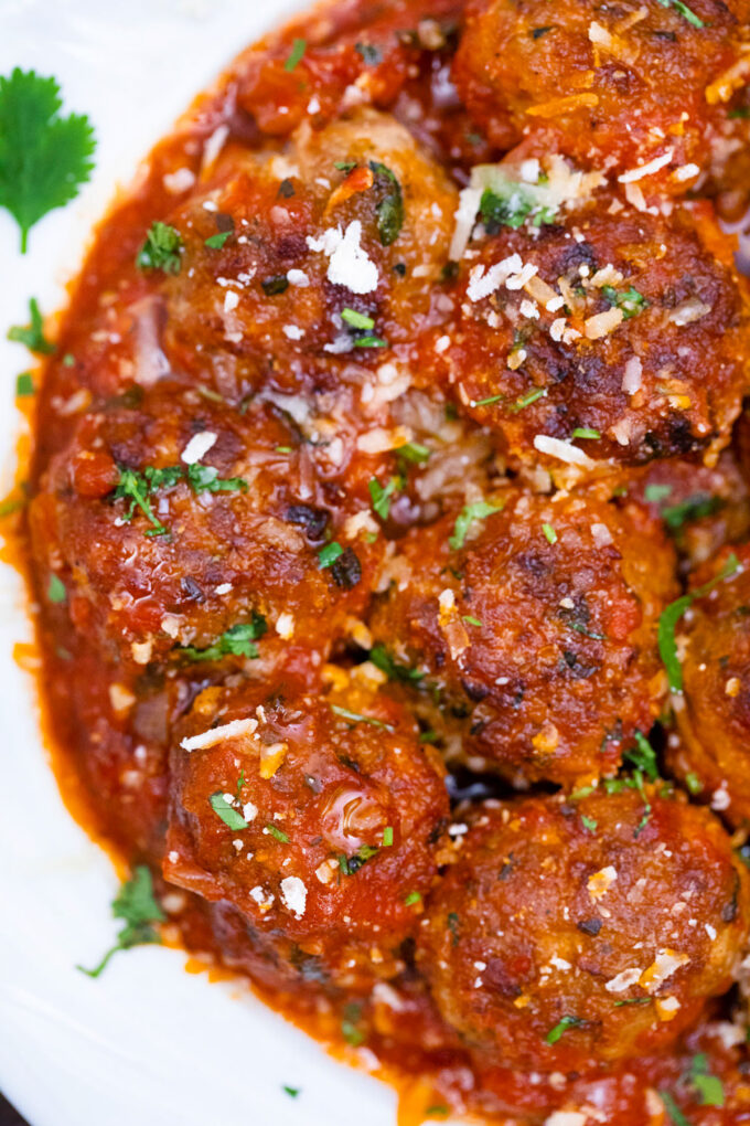 Juicy turkey meatballs topped with grated Parmesan cheese.