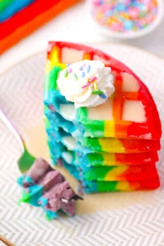 a stack of sliced rainbow waffles