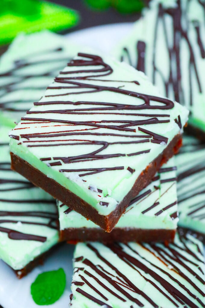 Homemade Irish mint brownies topped with melted chocolate.