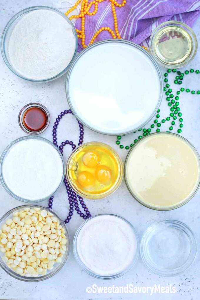 king cake poke cake ingredients on a table