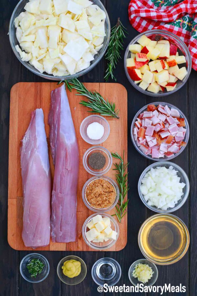 pork tenderloin with cabbage and apple ingredients on a table