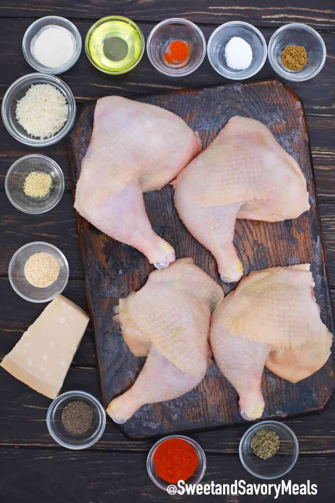 chicken thighs with seasoning ingredients on a table