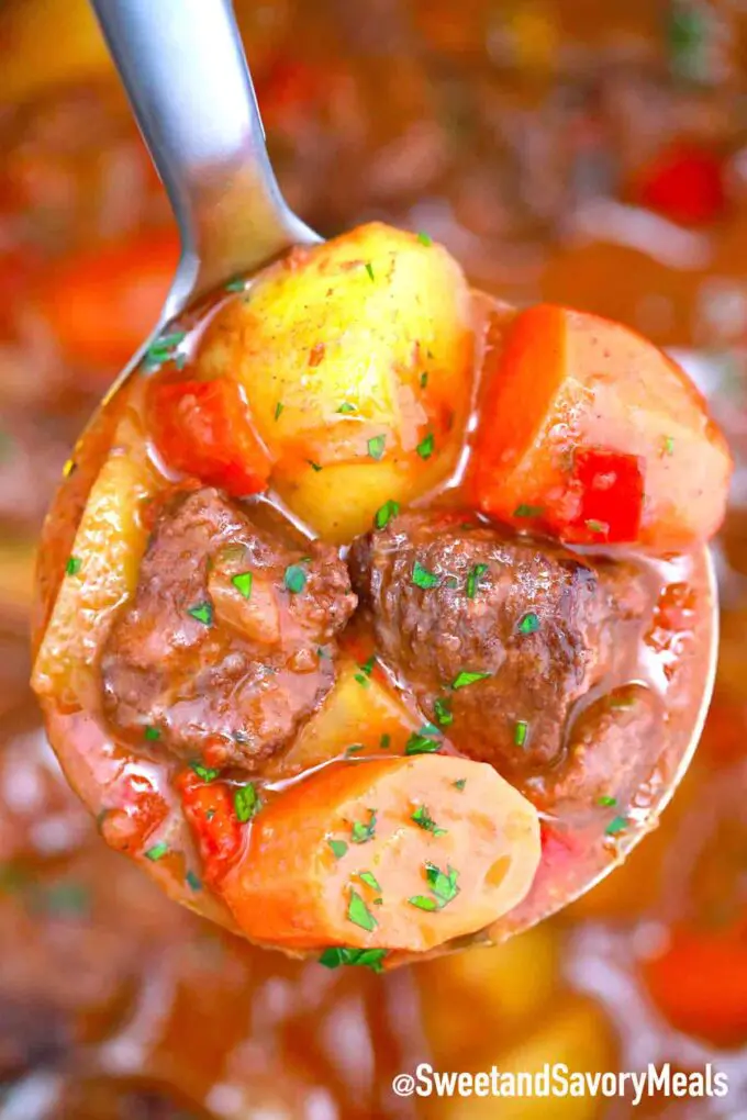 Mexican beef stew in a ladle