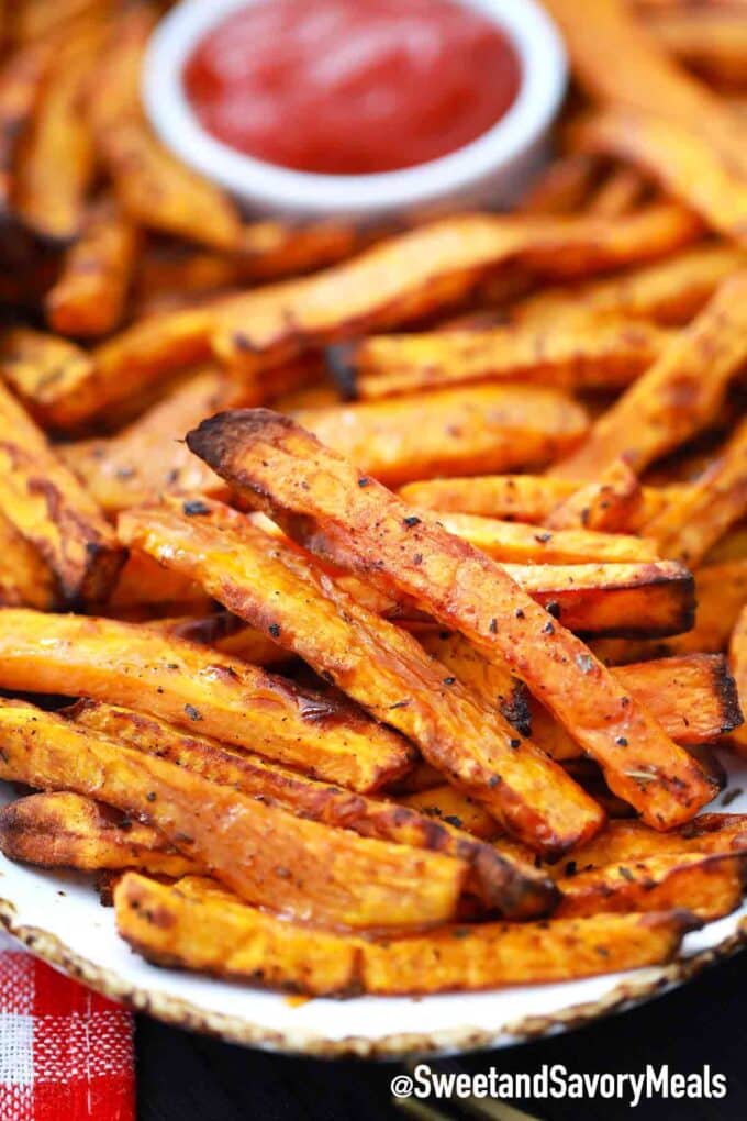 air fryer sweet potato fries with ketchup on a plate