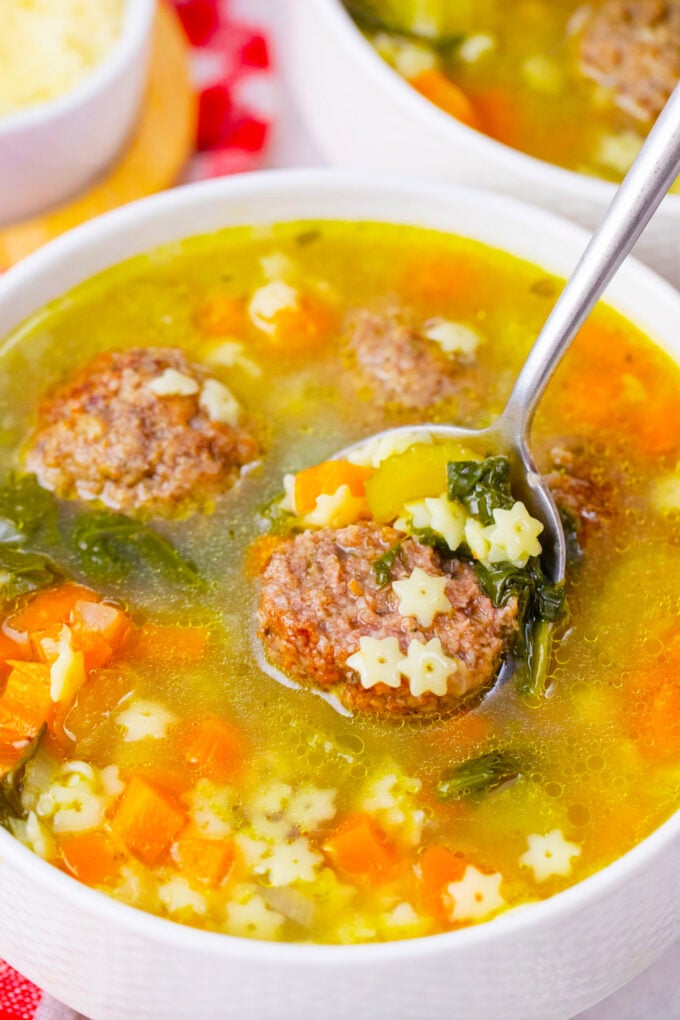 A spoonful of slow cooker Italian wedding soup.