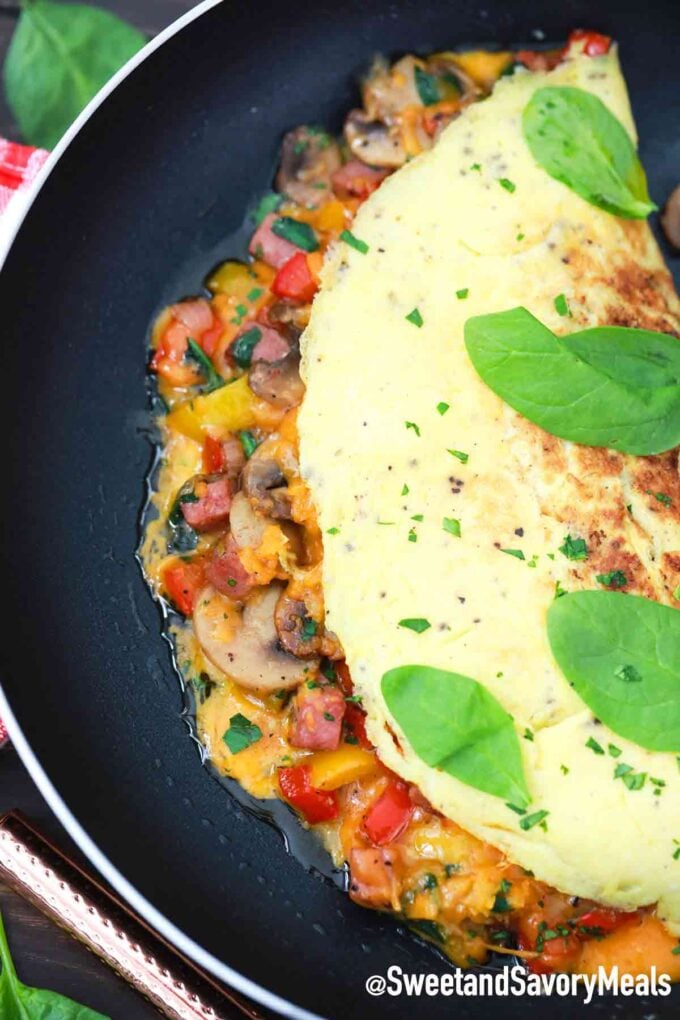 homemade omelette cooking in a skillet