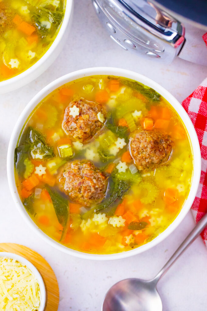 Overhead shot of a bowl of slow cooker Italian wedding soup.