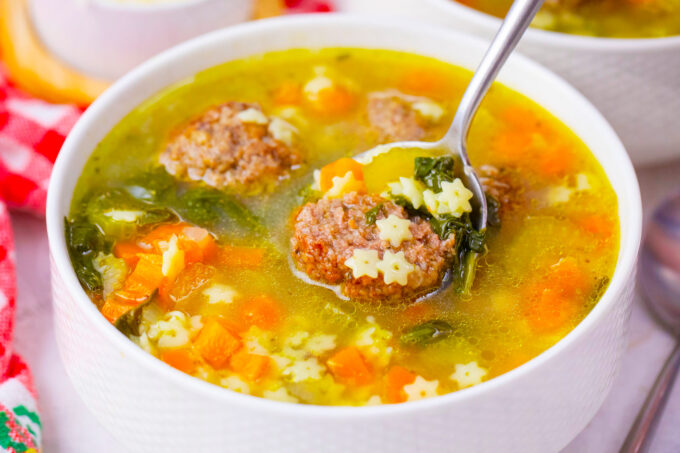 Cozy slow cooker Italian wedding soup with meatballs.