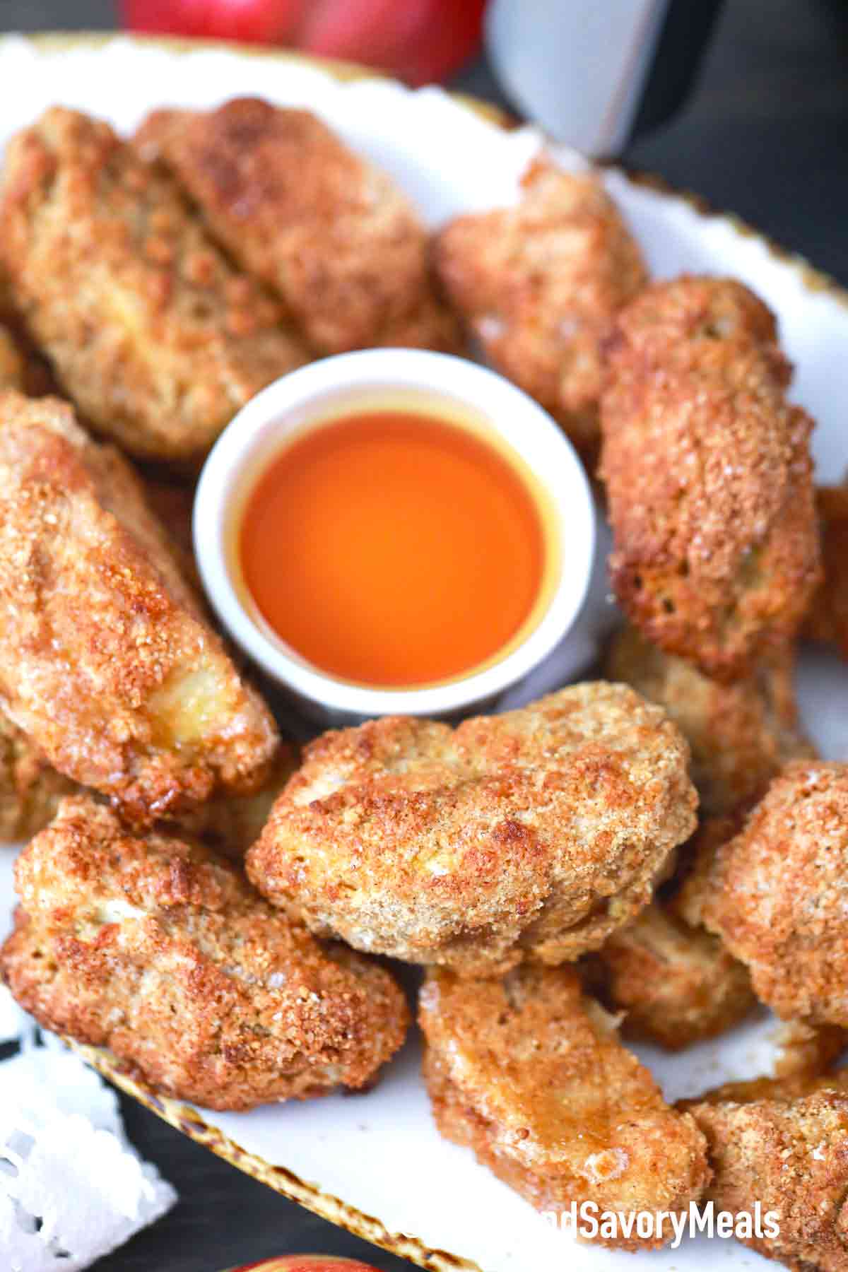 air fryer apples fries on a serving plate