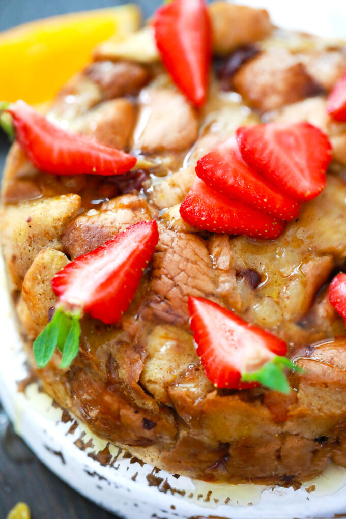 Overhead shot of Instant Pot bread pudding decorated with fresh strawberries.
