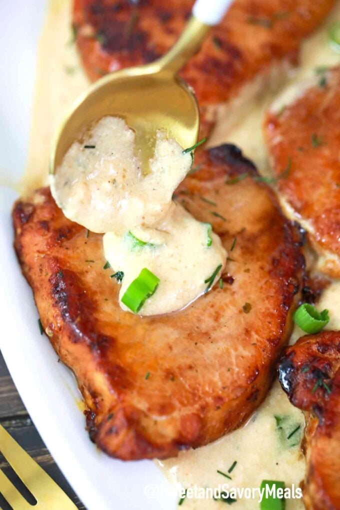 instant pot ranch pork chops with a spoonful of sauce
