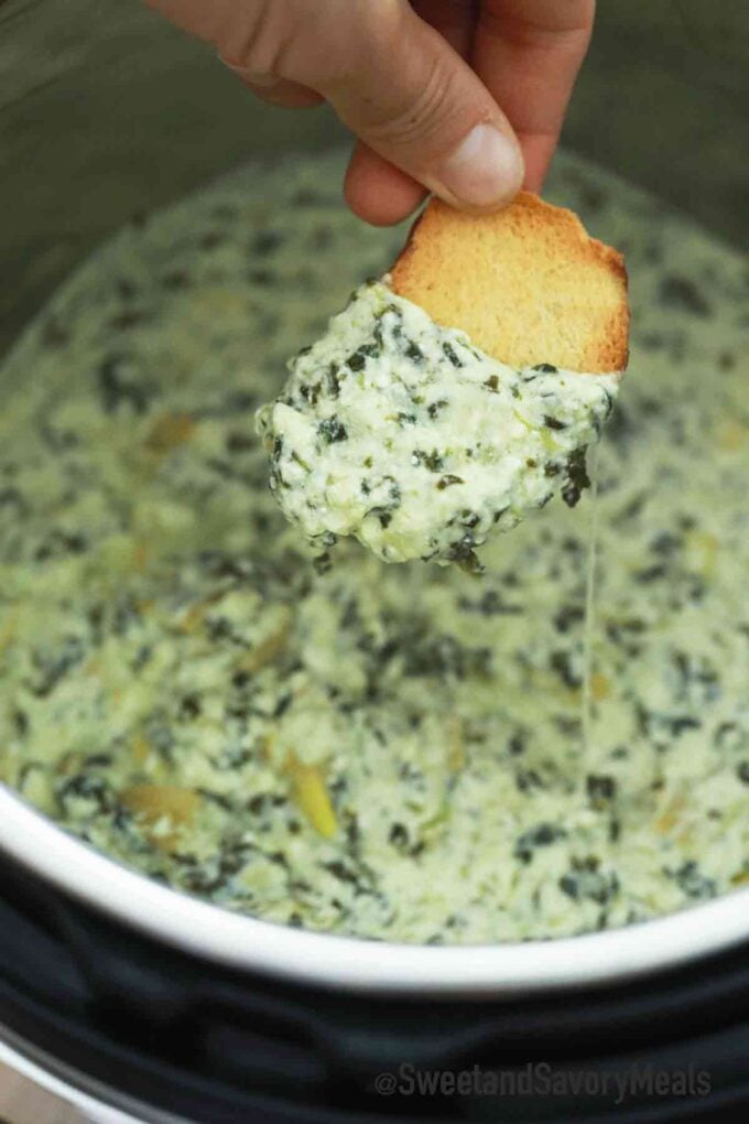 instant pot spinach artichoke dip on a crostini