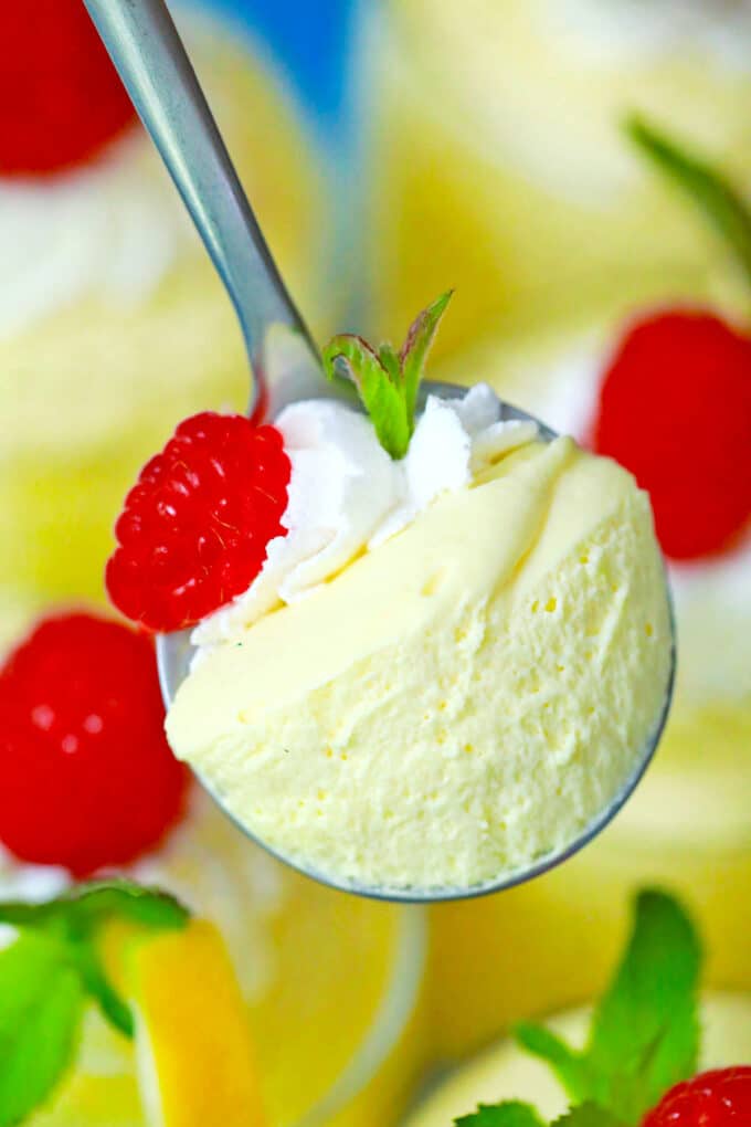 A spoonful of creamy lemon mousse.