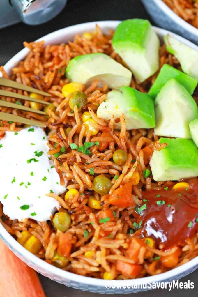 pressure cooker Mexican Rice in a bowl with toppings