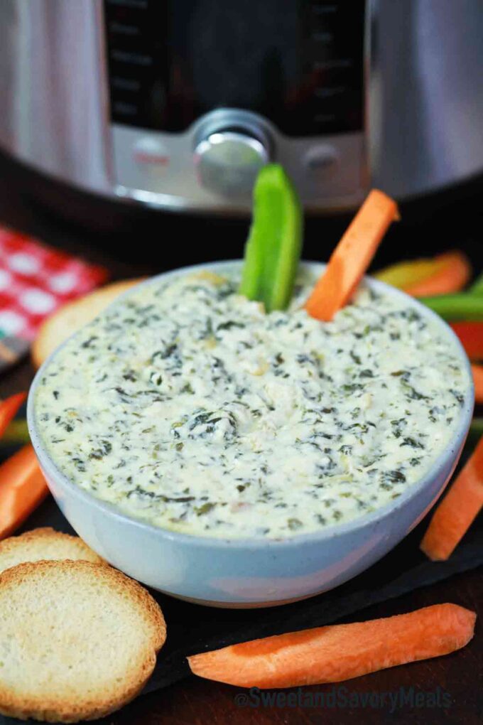 bowl of pressure cooker spinach artichoke dip