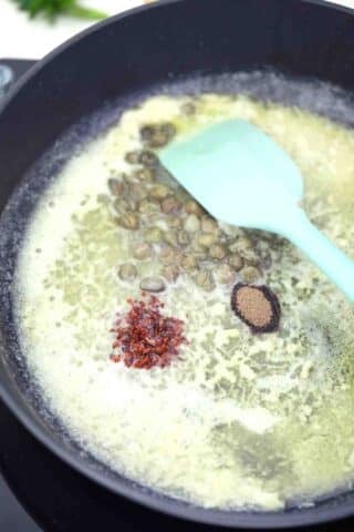 sautéing spices in melted butter