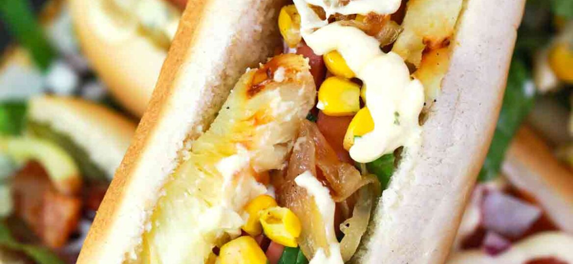 hot dog with grilled pineapple and corn