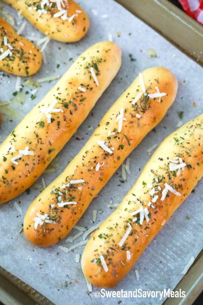 breadsticks on a baking sheet