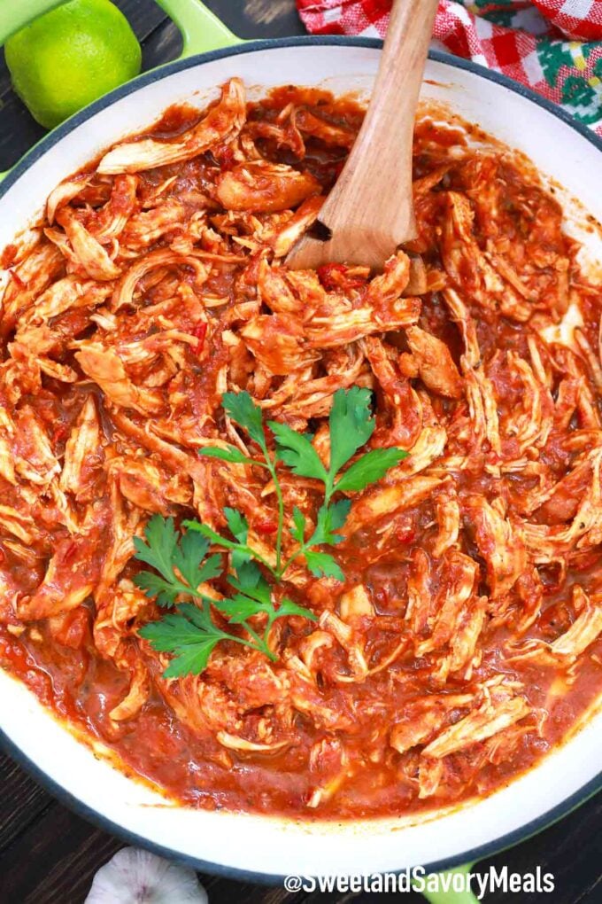 chicken tinga in a skillet with cilantro