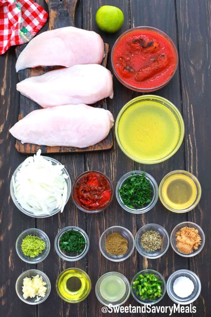 chicken tinga ingredients on a wooden table
