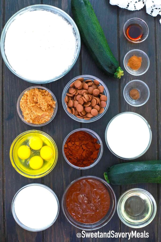 chocolate zucchini cake ingredients on a wooden table