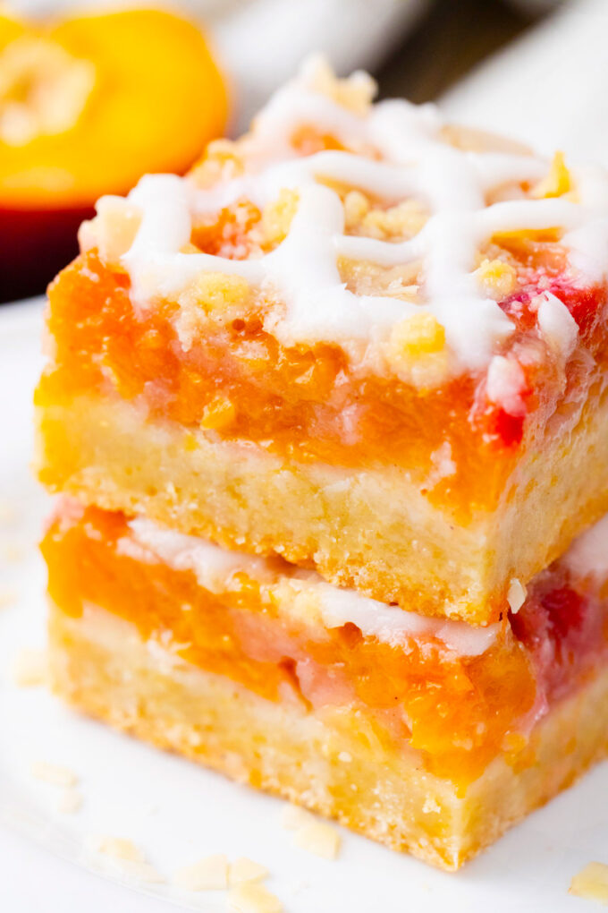 Stacked peach crumb bars.