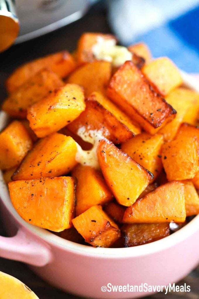 cubed and browned instant pot butternut squash in a serving bowl