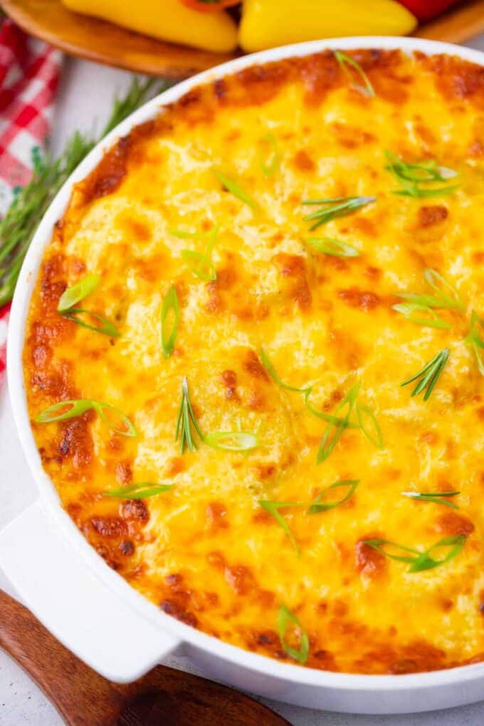 Overhead shot of a baking dish with cheesy instant pot scalloped potatoes.