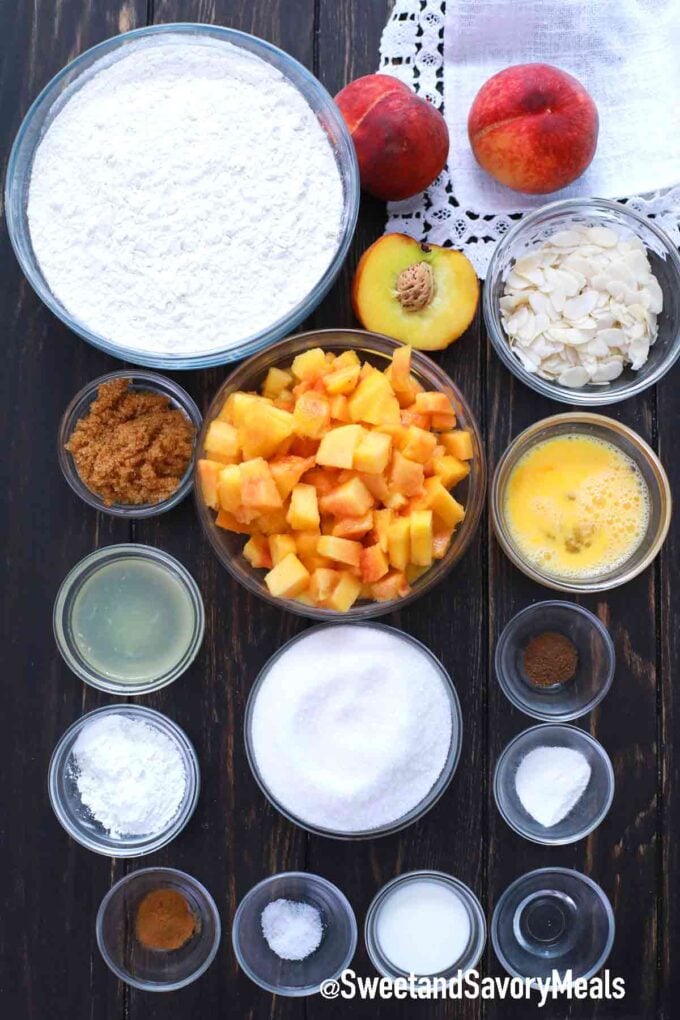 peach crumb bars ingredients on a wooden table