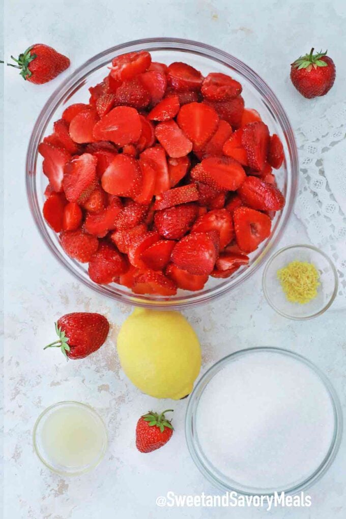 strawberry sauce ingredients on a white table