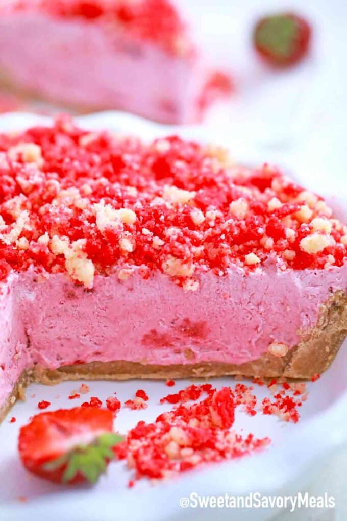 strawberry shortcake freezer pie sliced in a baking dish