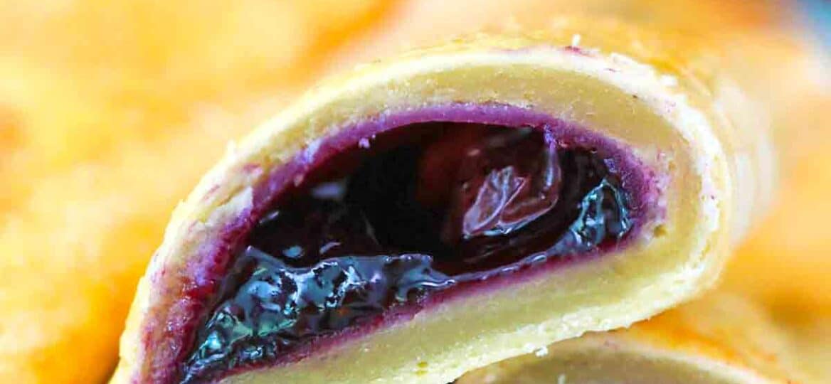 blueberry hand pie sliced in half