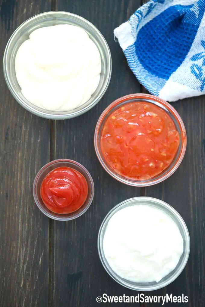 bang bang sauce ingredients in individual bowls on a table