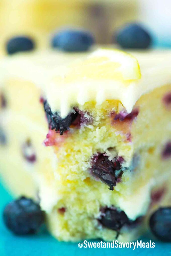 layer lemon blueberry cake with a bite