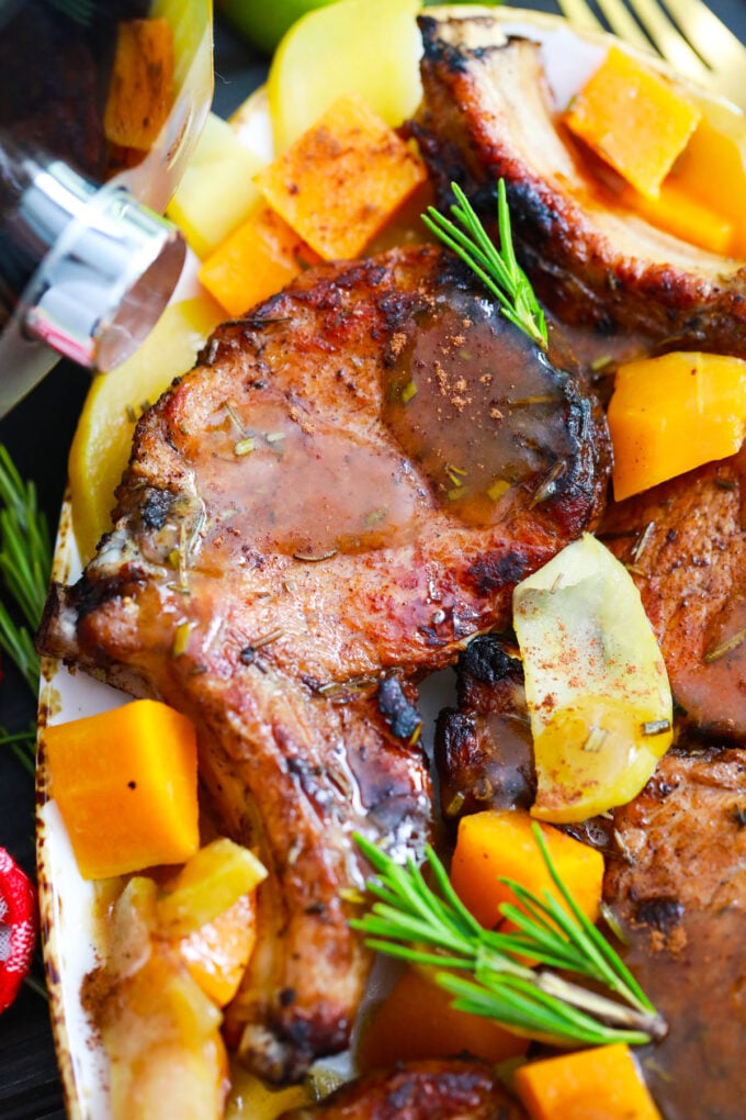Overhead shot of instant pot apple cinnamon pork chops with brown sugar sauce.