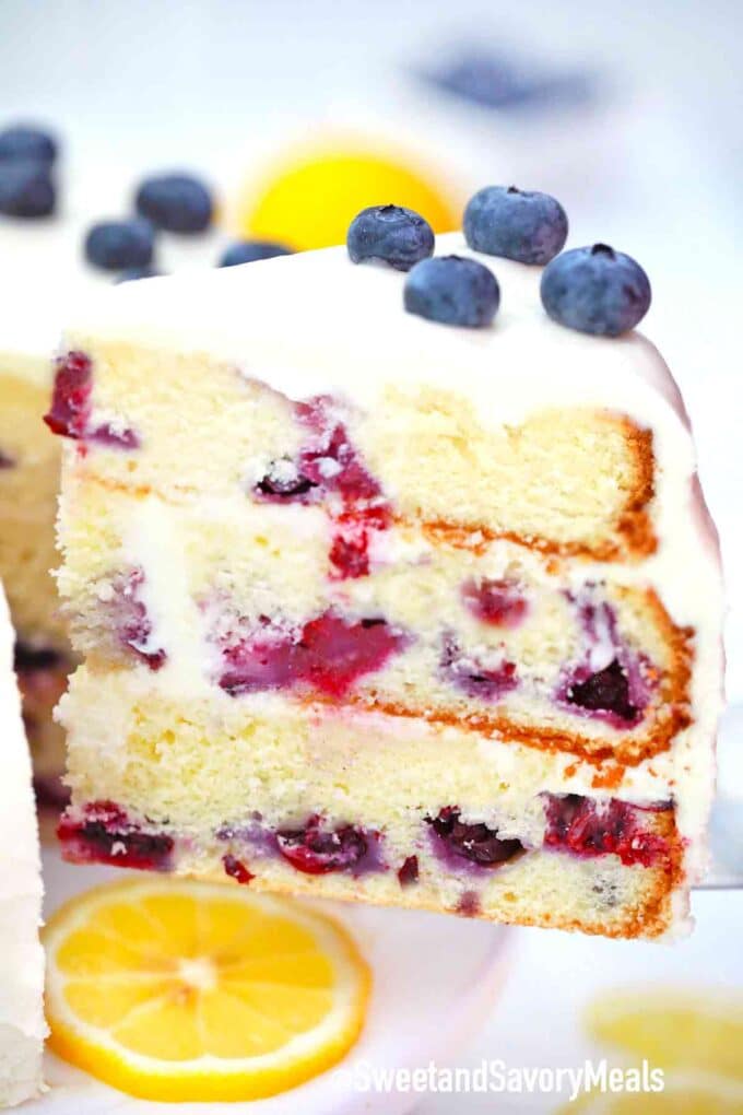 a slice of a blueberry lemon layer cake