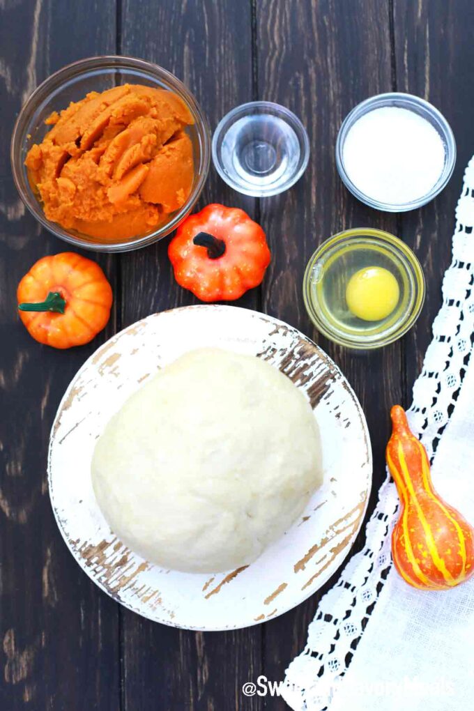 pumpkin hand pies ingredients in individual bowls on a table