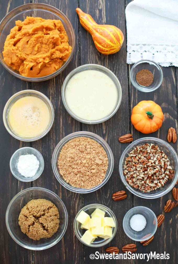 pumpkin pie ingredients in individual bowls on a table