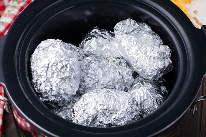 Wrapped potatoes in foil in the slow cooker.