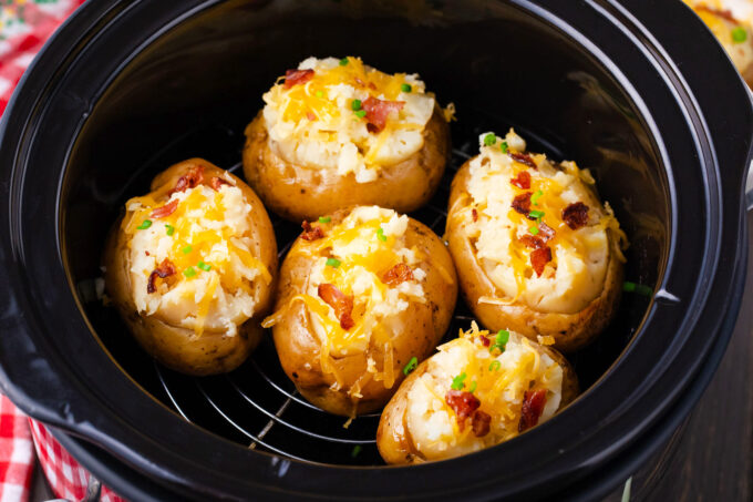 Overhead shot of slow cooker baked potatoes.