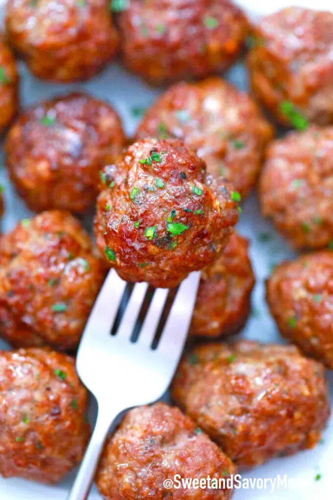 a fork with a meatball