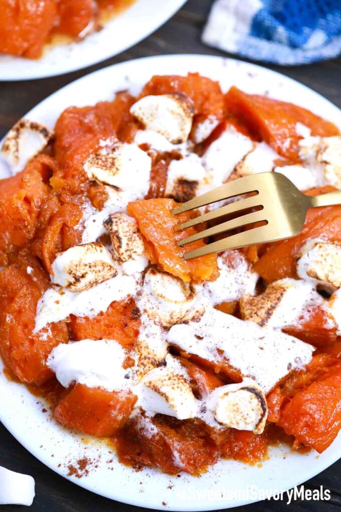a plate of sweet potatoes with marshmallows