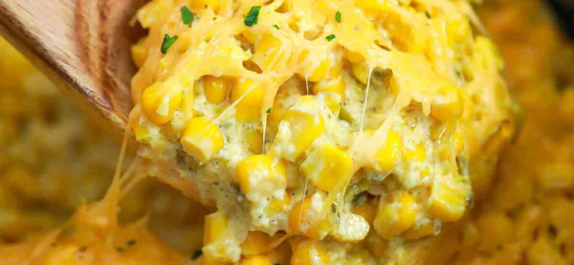 a spoonful of cheesy slow cooker creamed corn
