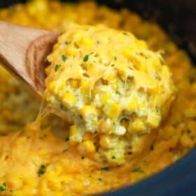 a spoonful of cheesy slow cooker creamed corn