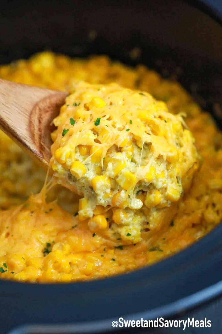 a spoonful of cheesy slow cooker creamed corn